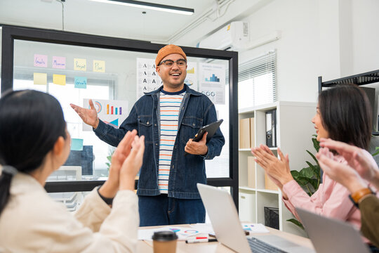 Asian business start up freelance people team analyzing statistics financial. Group Team of businesspeople man and woman Meeting Conference Discussion various topic Corporate Concept in office.