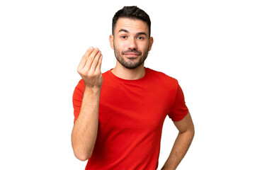 Young handsome caucasian man over isolated chroma key background making Italian gesture