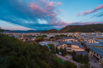 Shangri-La Cityscape with Mountain Valley at Dramatic Sunset