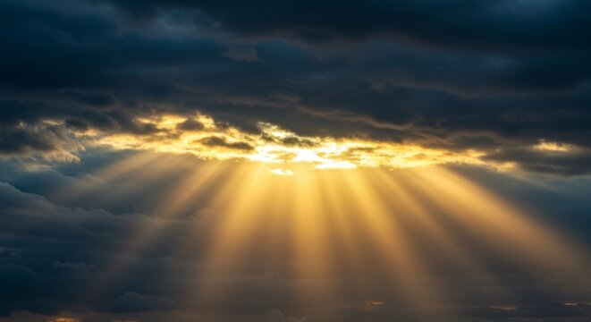 Sunbeams pierce dark clouds