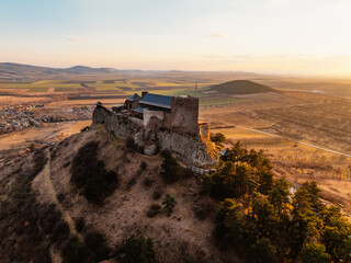 Watchtower of Boldogkő or Boldogko fortress with Boldogkővárallja village near tokaj region in...