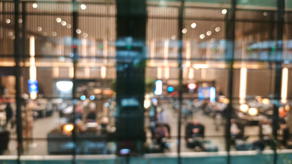 Blurred view of a bustling airport lounge.