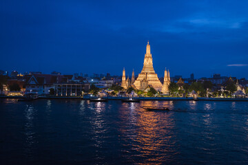 Wat Arun, a destination for travelers during sunset,
 Thailand - Famous Landmark Iconic of Bangkok