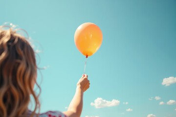 Woman's Hand Releasing Balloon into the Sky in Close-up Shot