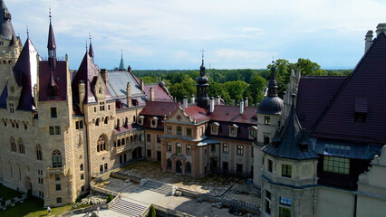 Obraz premium Moszna Castle fly over landscape view from above architecture near the village Moszna Poland