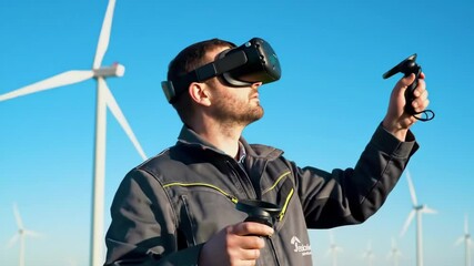 Man wearing virtual reality headset and controllers in a wind farm, symbolizing future energy, technology, immersive simulation, and renewable resources. - Powered by Adobe