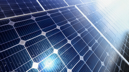 Close-up view of multiple solar panels generating clean renewable energy. Suitable for topics on...
