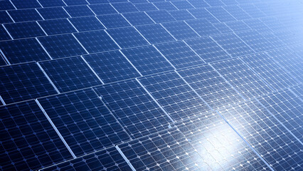 Close-up view of multiple solar panels generating clean renewable energy. Suitable for topics on...