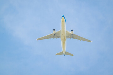 Low angle view of a passenger plane while flying