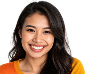 Happy young Asian woman with bright smile wearing yellow sweater