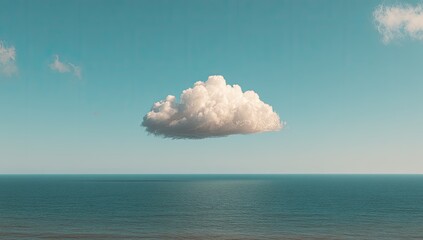 Solitary cloud over tranquil ocean