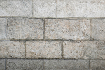 Vieux mur en pierre de taille calcaire