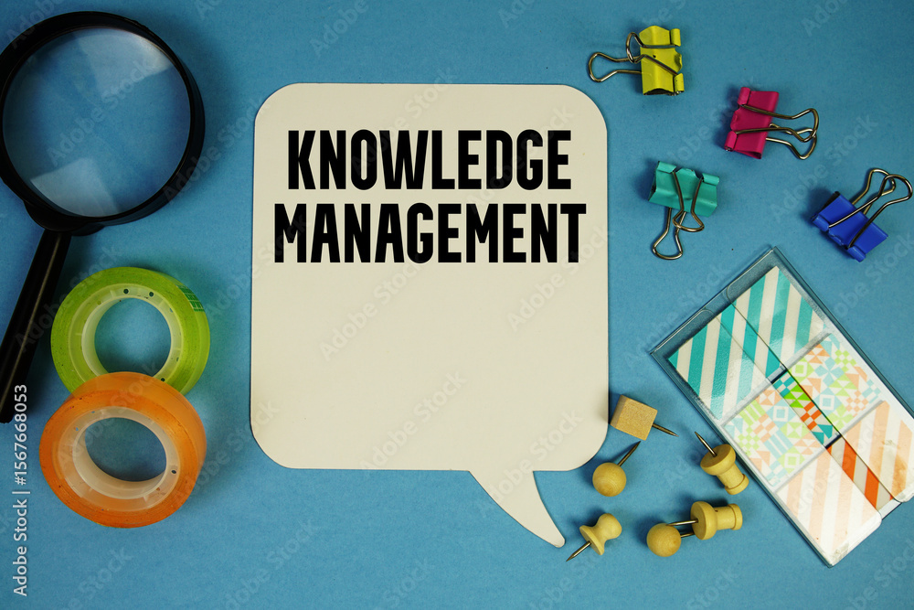 Poster knowledge management text with magnifying glass on blue background