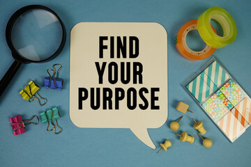 Find Your Purpose text with magnifying glass on blue background