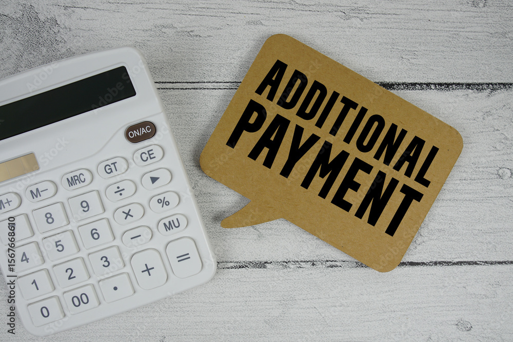 Poster additional payment text with calculator on wooden background