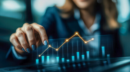 Businesswoman analyzing growing financial data on transparent digital graph