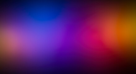 Obraz premium A vibrant, blurred abstract background with a spectrum of colors that meld and flow together seamlessly