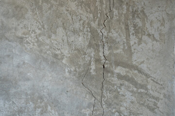 Dirty concrete cement white grey wall grunge rough crack surface damage. Old cracked wall