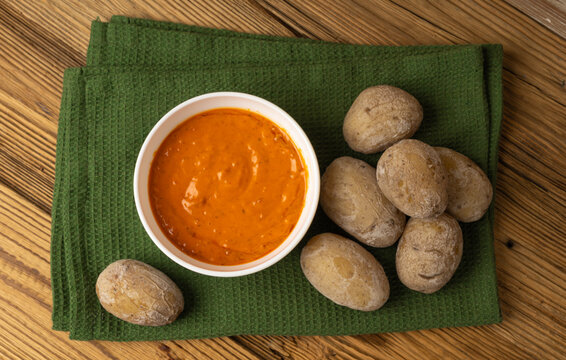 Red mojo rojo and green mojo verde sauces, traditional Tenerife dips, mojo picon dressing