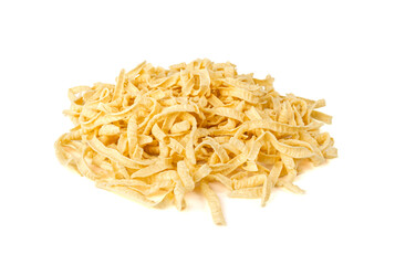 Passatelli spatzle pasta isolated, raw spaetzle noodles, dry homemade german macaroni