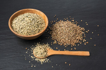 Shelled hemp seeds pile, peeled cannabis grains, marijuana kernels without peel