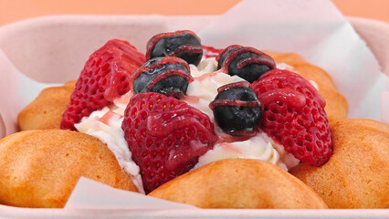 Choux cream with fresh cream and berries.
