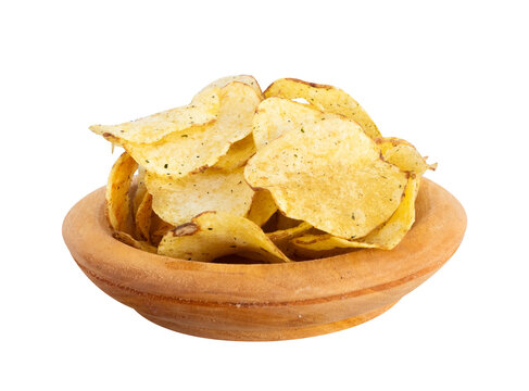crispy and delicious potato chips in a wooden bowl isolated on a white background