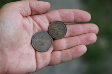Rare old copper coins of Russian Empire in hand