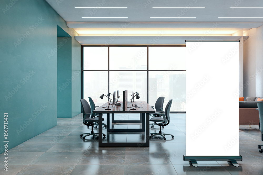 Poster sleek modern office interior with empty desks and a blank roll-up banner mockup near large windows i