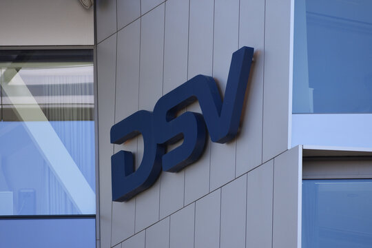 DSV International Shared Services company logo, signage on the office facade, Danish transport and logistics company. WARSAW, POLAND - APRIL 13, 2025