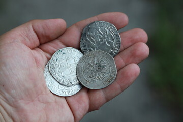 Huge medieval european silver coins in hand