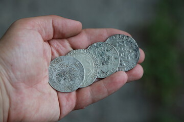 Huge medieval european silver coins in hand