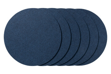 Group of six dark blue circular felt placemats arranged in a fan shape isolated on transparent...