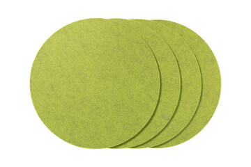 Four round lime green felt placemats arranged in a stack isolated on transparent background