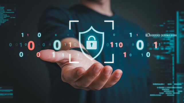 Futuristic digital security concept glowing cyan shield with padlock hovers above palm-up hand, binary code and code blur background