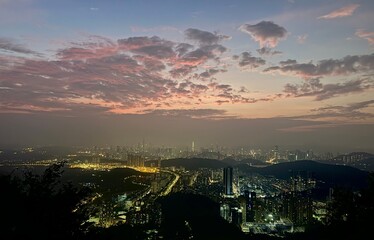 sunset over the city Shenzhen from Wutong Mountain