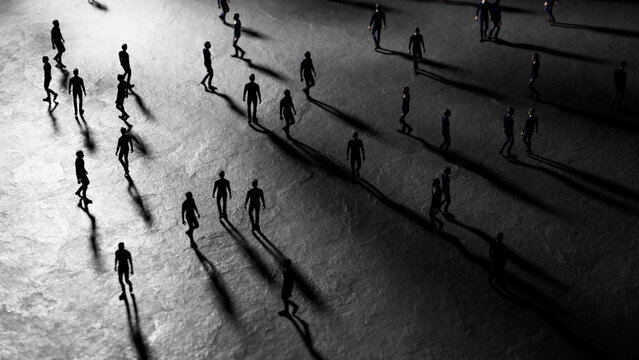 Miniature figurines of people walking forward with long shadows cast by dramatic lighting creates a concept of conformity, dystopia, or migration