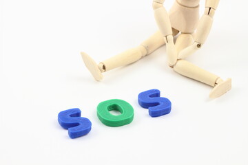 デッサン人形、助け求める姿