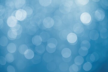 Fototapeta premium Soft blue and white bokeh lights with a blurred effect