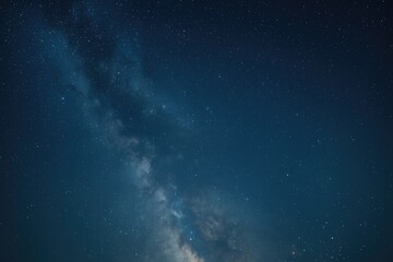 Fototapeta premium Star-filled night sky with a glowing Milky Way across the cosmos