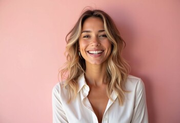 Fototapeta premium Joyful Woman Smiling Brightly Against Pink Wall