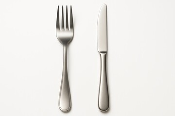 Metallic electrical connector and utensil isolated on a white background