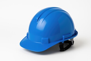 Blue safety helmet isolated on white backdrop with workwear and protective gear for construction sites