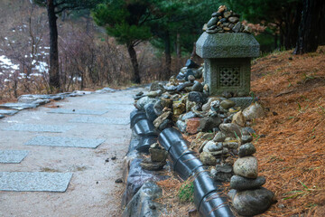 footpath and pebble stacks at the Buddhist temple