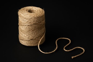 Black background featuring jute string
