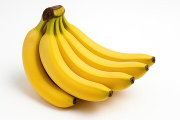 Group of ripe bananas displayed against a white backdrop