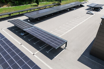 Aerial view of parking space with solar canopies