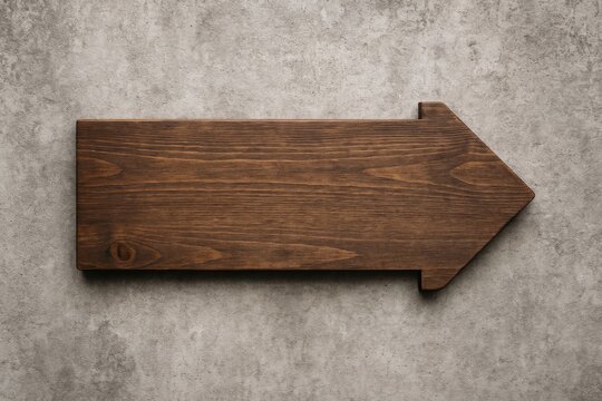 A rustic wooden plaque mounted on a concrete wall, ideal for adding personalized text