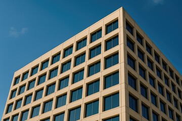Facade shot showcasing a structure with grid-like window panes from a ground-up perspective