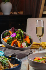 different salads with meat and seafood